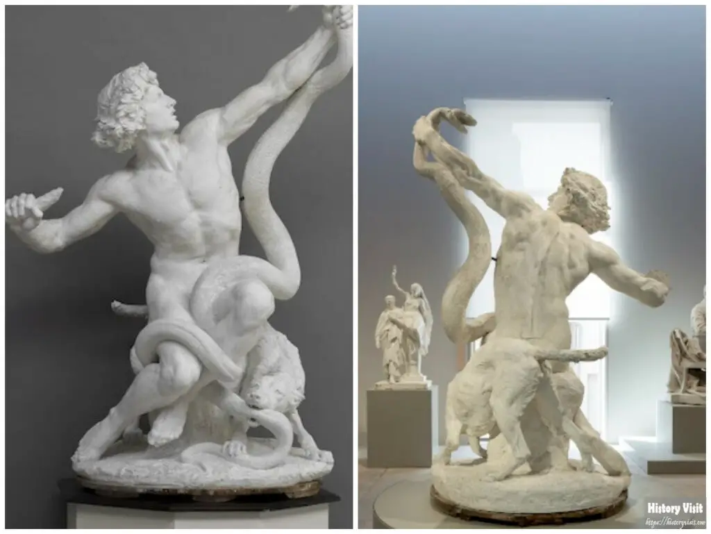 Man Fighting a Snake Statue